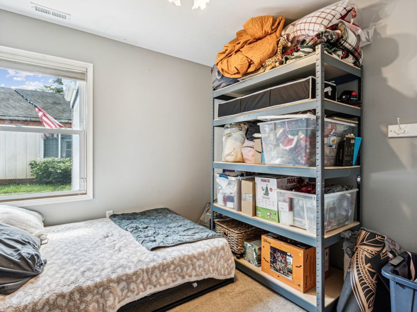 167 Heathgate Road Montgomery, IL 60538 - Photo 15 of 22 a bedroom with a bed and a window
