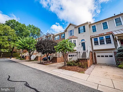 a view of a brick building with many windows