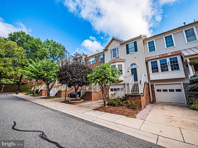 a view of a brick building with many windows