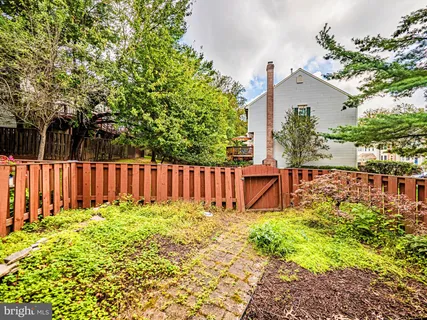 a view of a fence of the garden