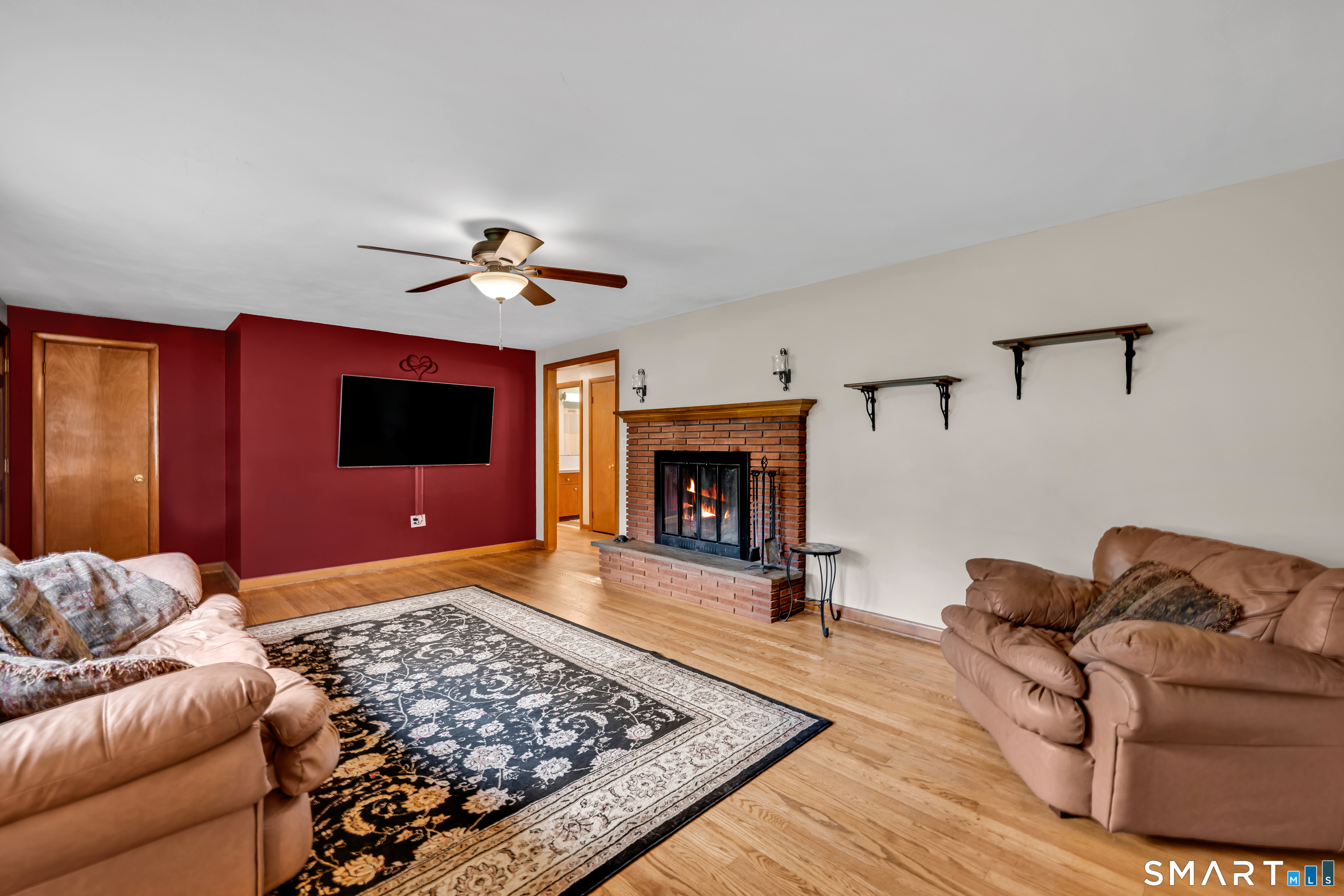 85 Timothy Road Naugatuck, CT 06770 - Photo 6 of 30 a living room with furniture and a fireplace