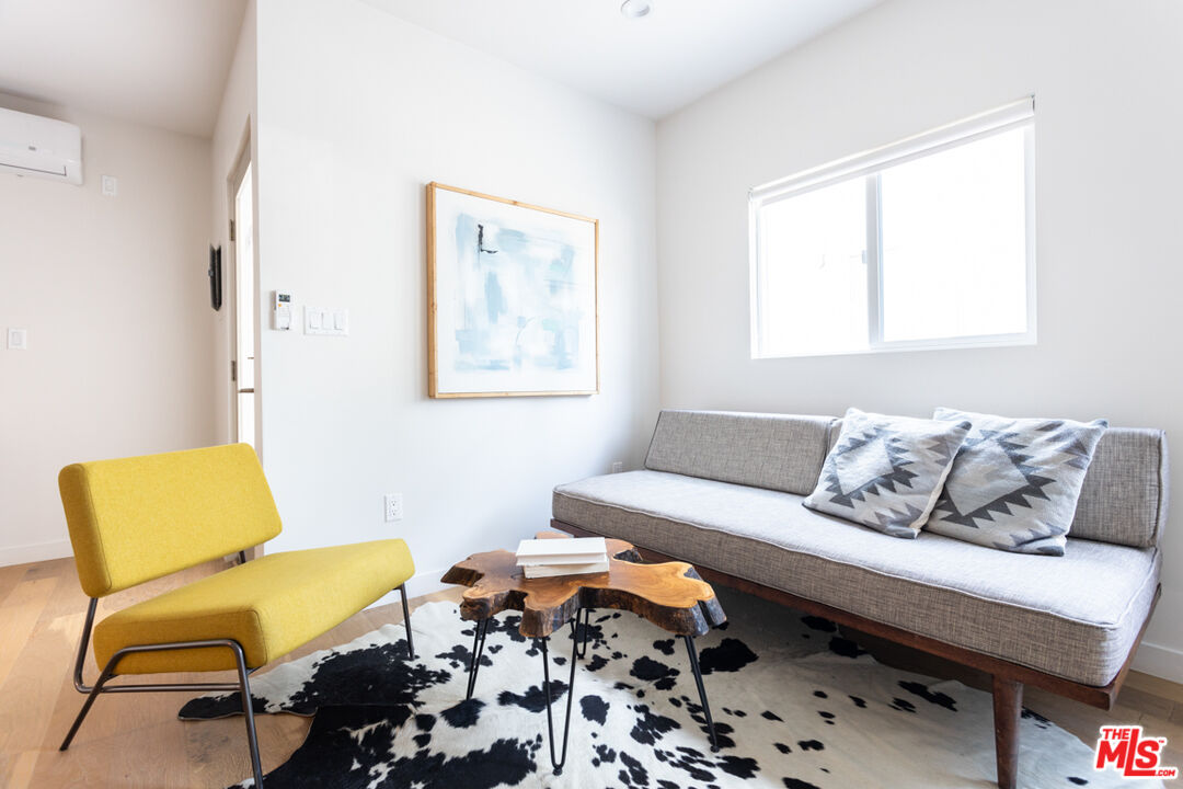 1946 Preston Avenue Los Angeles, CA 90026 - Photo 4 of 13 a living room with furniture and a window