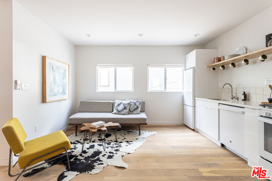 1946 Preston Avenue Los Angeles, CA 90026 - Photo 5 of 13 a living room with furniture and a window