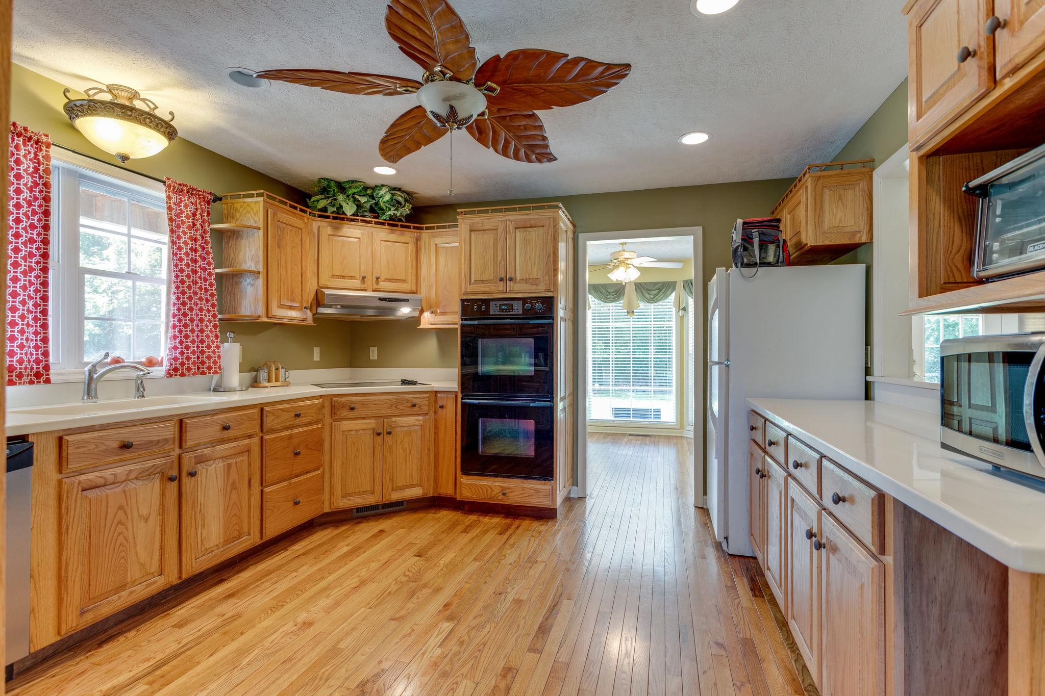 1909 Hunters Run Road Lewisburg, TN 37091 - Photo 11 of 30 Hardwoods throughout the down stairs have been refinished.