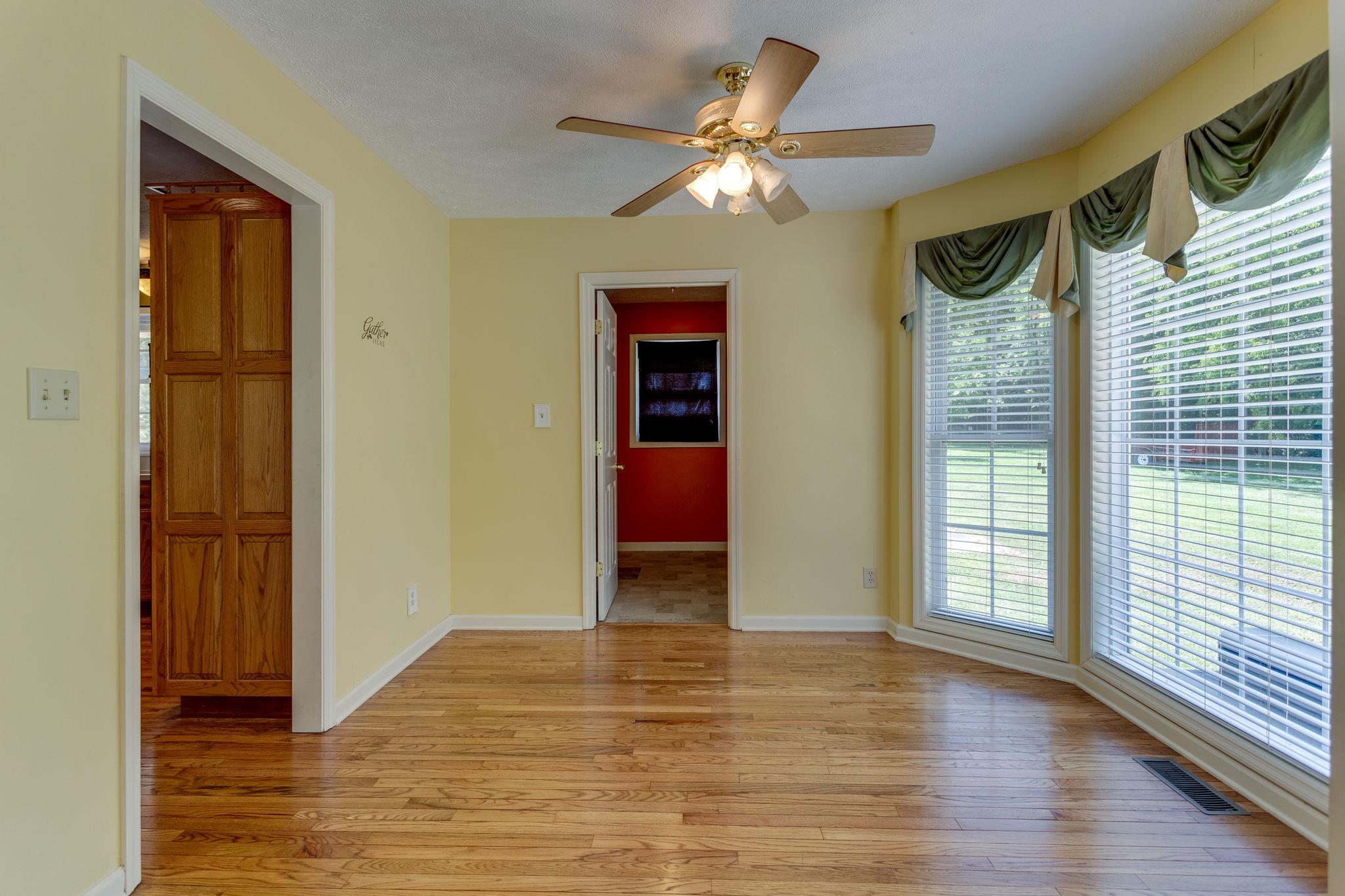 1909 Hunters Run Road Lewisburg, TN 37091 - Photo 13 of 30 Another view of the breakfast nook into the laundry room where the side entry door enters the home.