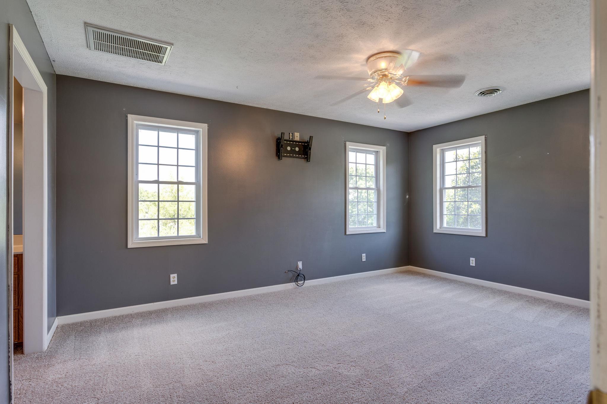 1909 Hunters Run Road Lewisburg, TN 37091 - Photo 20 of 30 Bedroom 2 (Master #2) is located upstairs with another full bath, large vanity area, and a walk in closet.