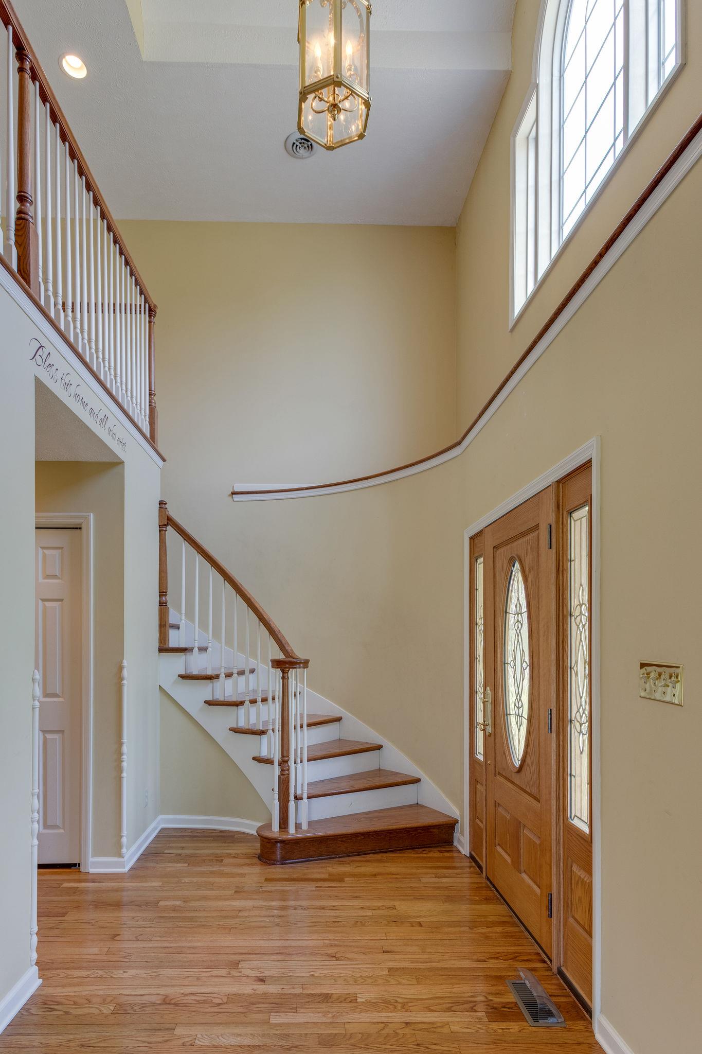 1909 Hunters Run Road Lewisburg, TN 37091 - Photo 5 of 30 Isn't this a beautiful staircase? Don't miss the upper shelving to the right that's great for seasonal decor!