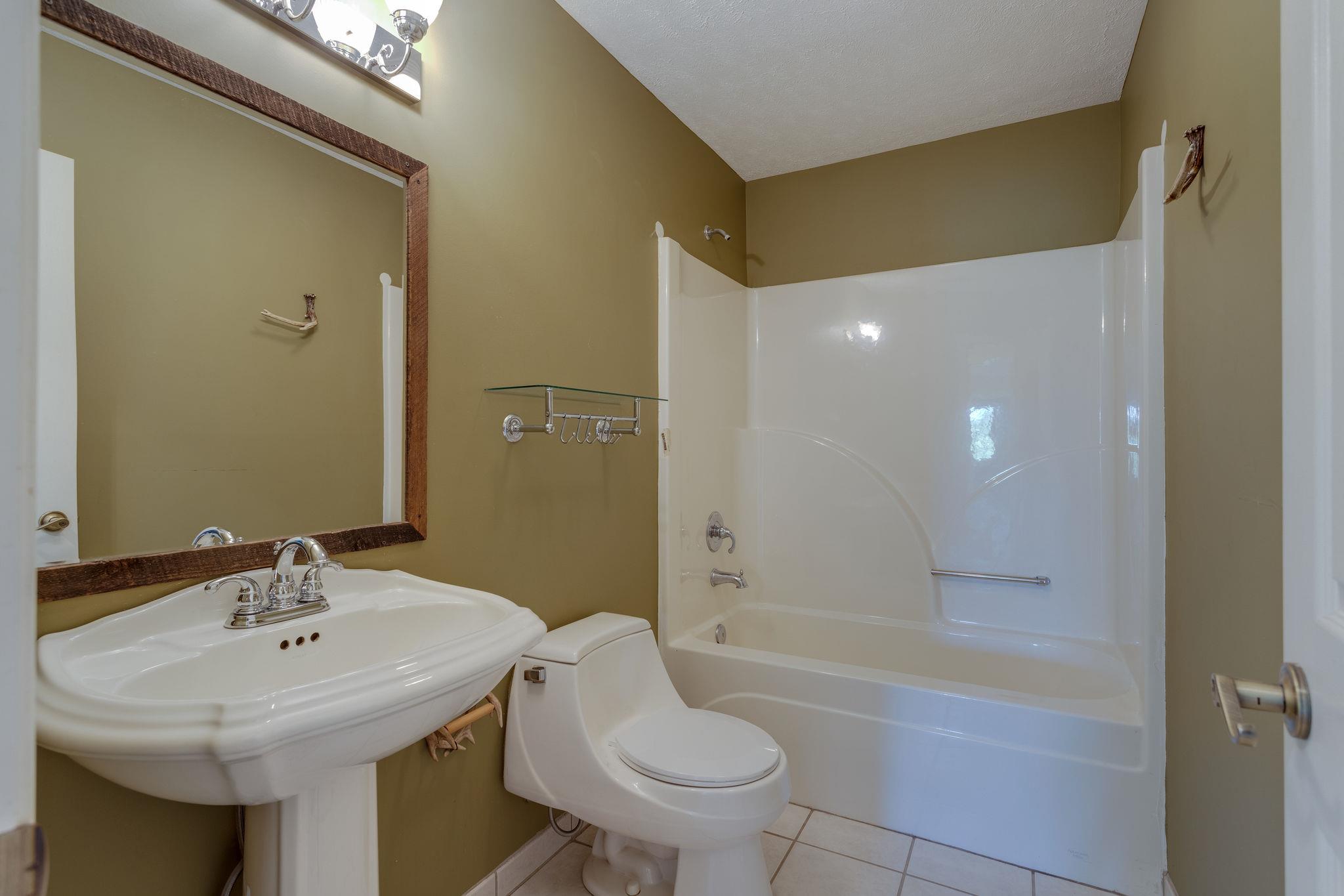 1909 Hunters Run Road Lewisburg, TN 37091 - Photo 8 of 30 Half bath convenient for your guests!