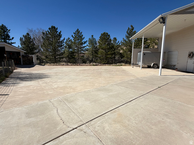 1697 West 2450 Vernal, UT 84078 - Photo 29 of 36 View of patio / terrace featuring concrete driveway