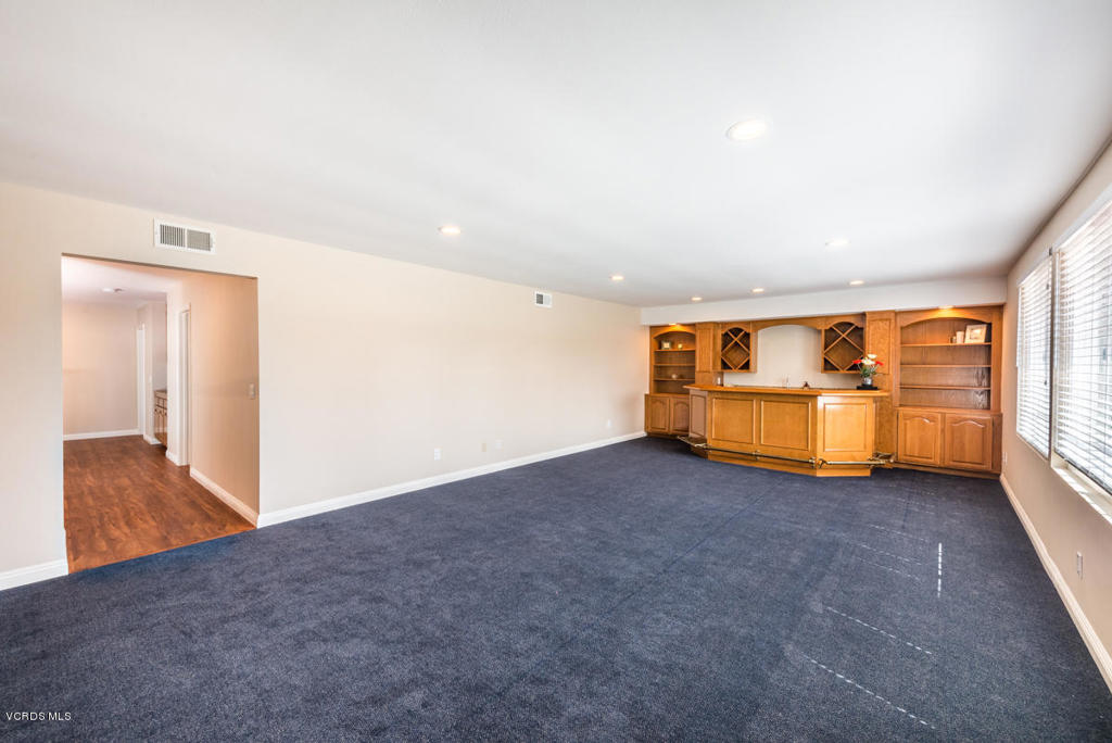3403 Fayance Place Thousand Oaks, CA 91362 - Photo 20 of 23 a view of an empty room with wooden floor and a window