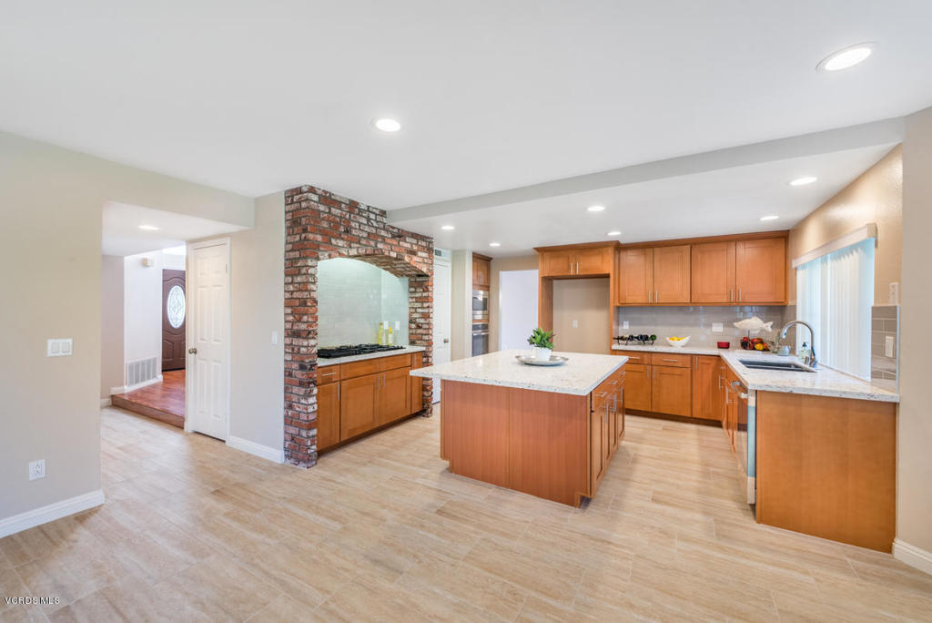 3403 Fayance Place Thousand Oaks, CA 91362 - Photo 2 of 23 a large kitchen with stainless steel appliances granite countertop a large counter top and a stove