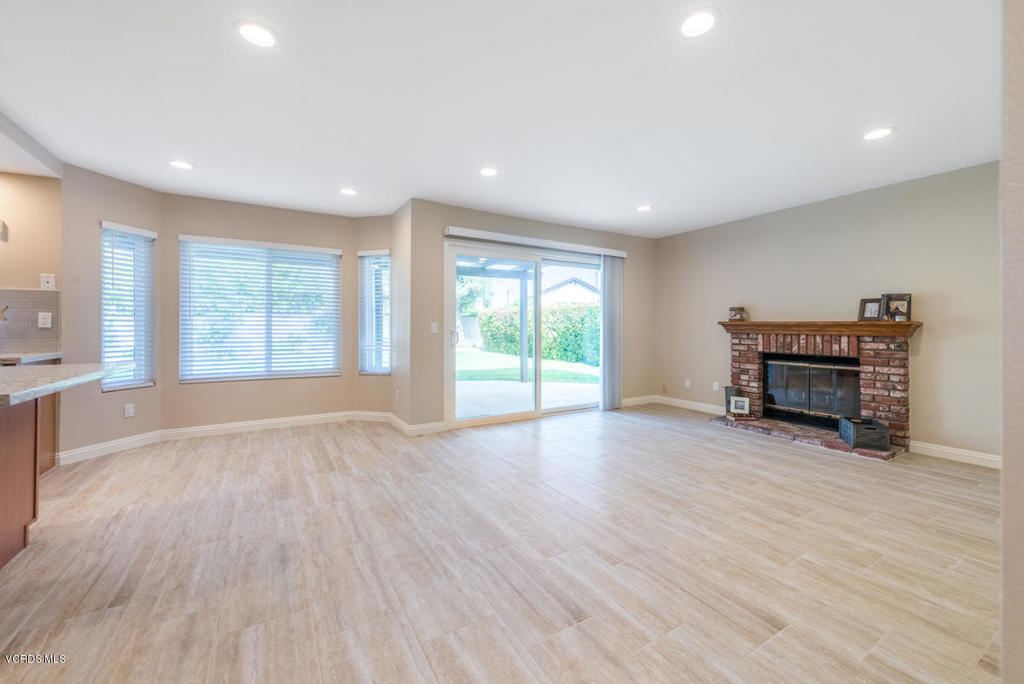 3403 Fayance Place Thousand Oaks, CA 91362 - Photo 4 of 23 a view of an empty room with a window and wooden floor