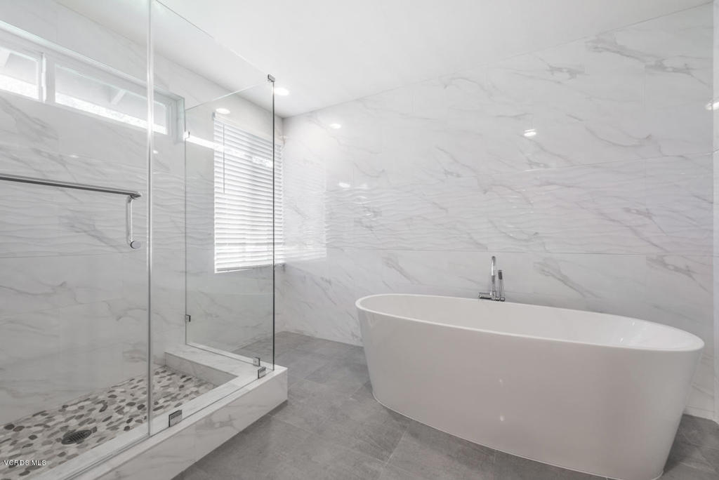 3403 Fayance Place Thousand Oaks, CA 91362 - Photo 6 of 23 a bathroom with a bathtub and shower