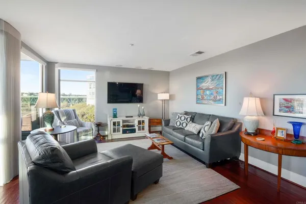 a bedroom with a bed and a desk