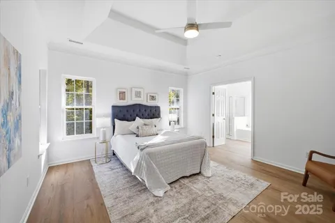 a bed room with a bed and a window