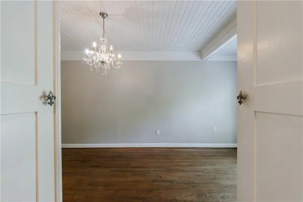 a room with a bed and a window