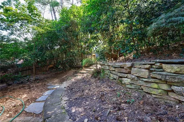 a view of a backyard with a garden
