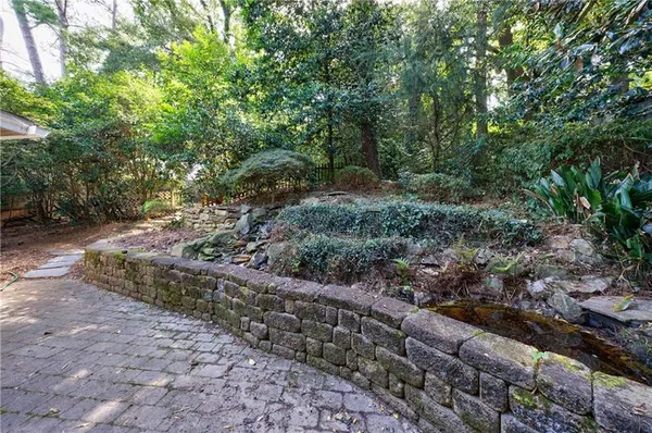 a kitchen with stainless steel appliances a refrigerator and a stove