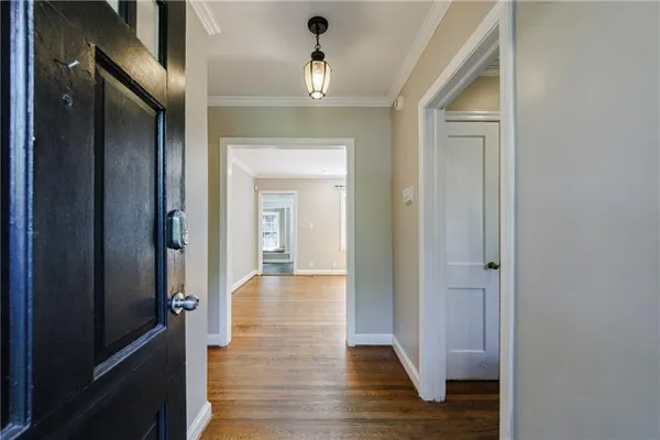 a kitchen with a sink and large window