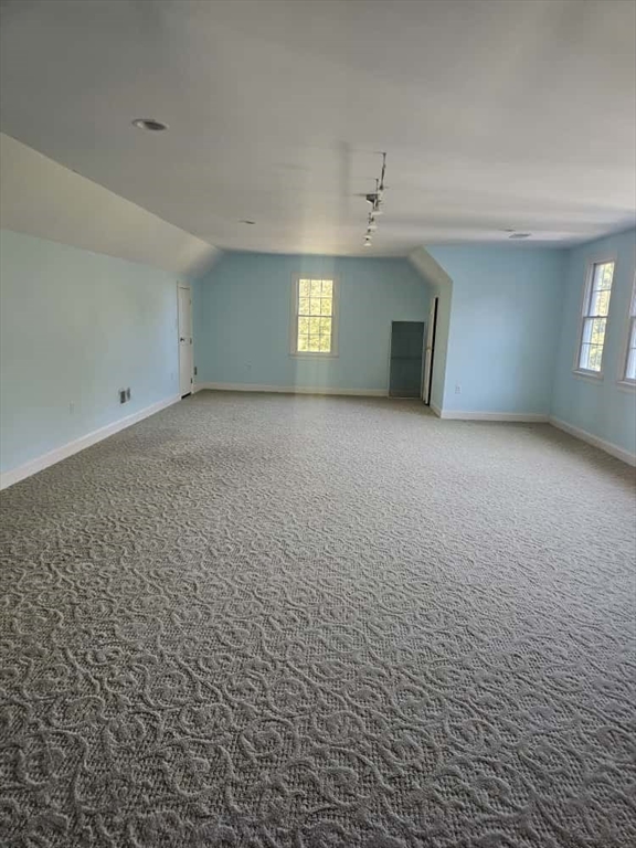 4 Shoe String Lane Westwood, MA 02090 - Photo 17 of 28 a view of an empty room with a window and fireplace