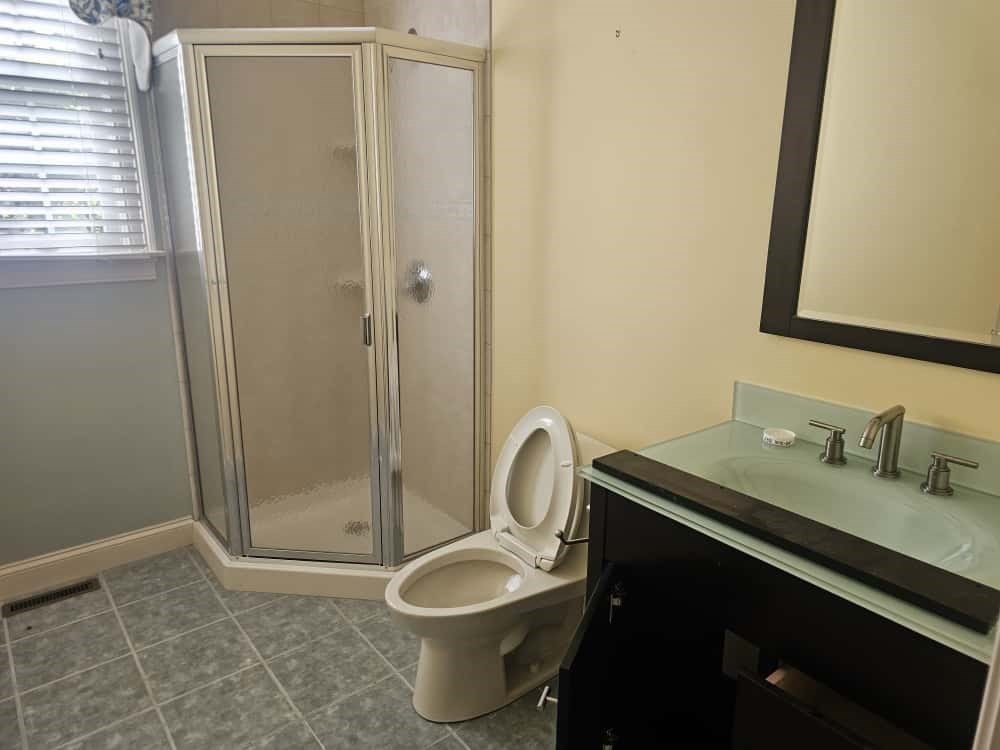 4 Shoe String Lane Westwood, MA 02090 - Photo 19 of 28 a bathroom with a sink toilet and shower
