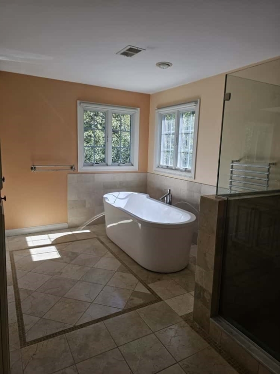 4 Shoe String Lane Westwood, MA 02090 - Photo 20 of 28 a view of a bathtub in a room