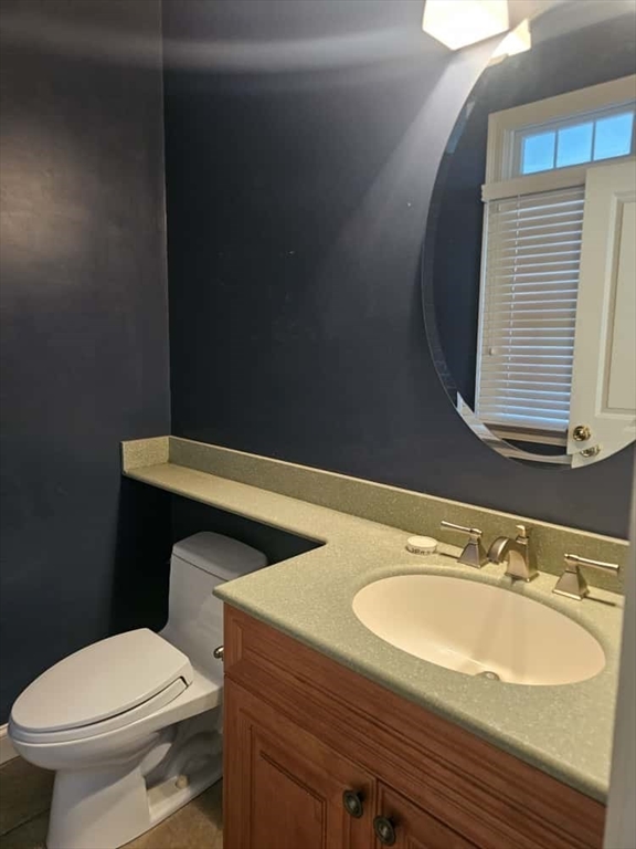 4 Shoe String Lane Westwood, MA 02090 - Photo 22 of 28 a bathroom with a sink toilet and mirror