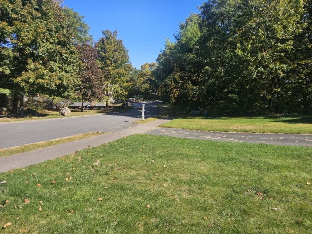 4 Shoe String Lane Westwood, MA 02090 - Photo 3 of 28 a view of a field of grass and trees
