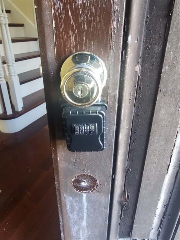 4 Shoe String Lane Westwood, MA 02090 - Photo 4 of 28 a close view of door lock