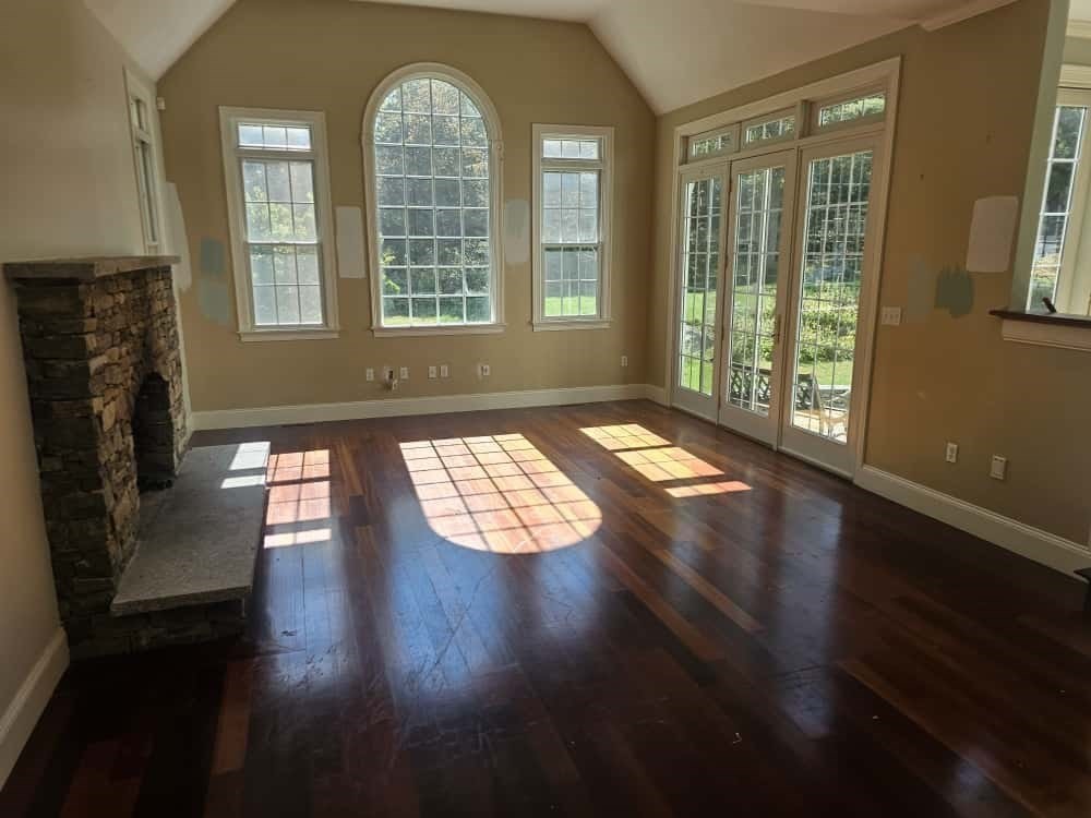 4 Shoe String Lane Westwood, MA 02090 - Photo 6 of 28 a view of an empty room with wooden floor and a window