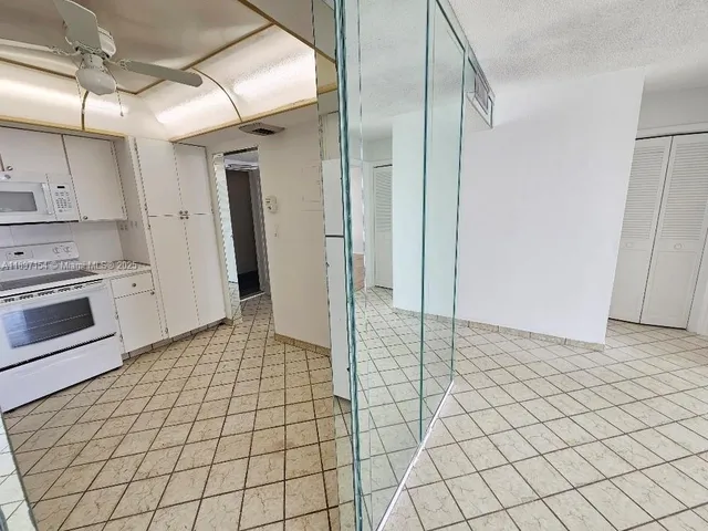 a view of a kitchen cabinets