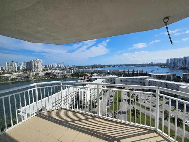 a view of a balcony with city view
