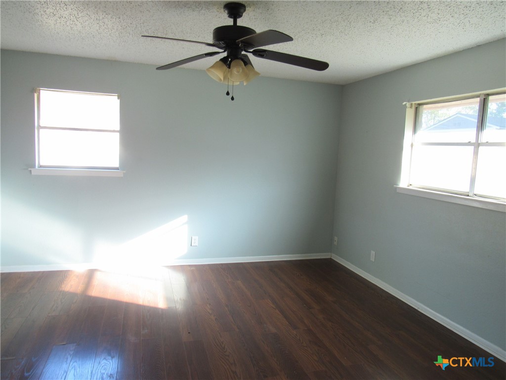 1325 Paseo Del Cobre Temple, TX 76502 - Photo 6 of 15 a view of empty room with wooden floor and fan