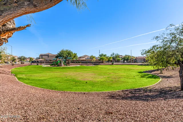 a view of a golf course with a garden