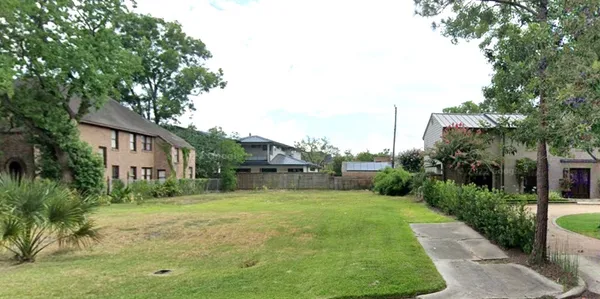 a house view with a garden space