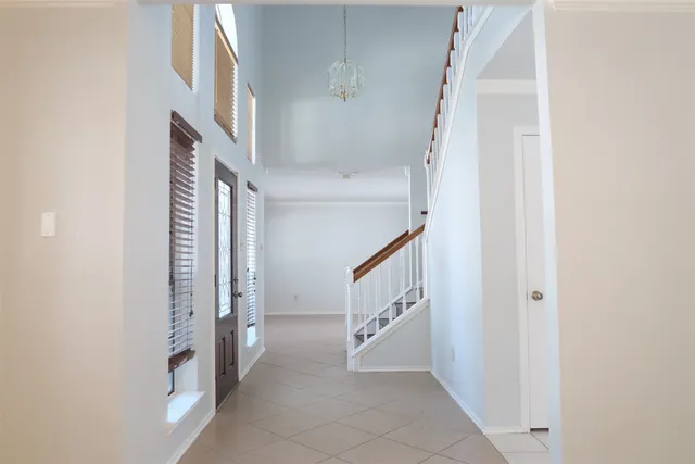 a view of an entryway with stairs
