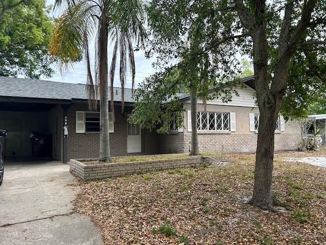 a house with trees in front of it