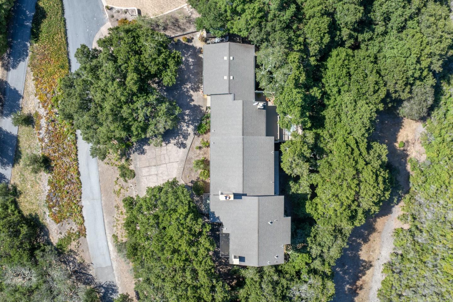 25940 Colt Lane Carmel Valley, CA 93924 - Photo 38 of 40 an aerial view of a house with a yard and garden
