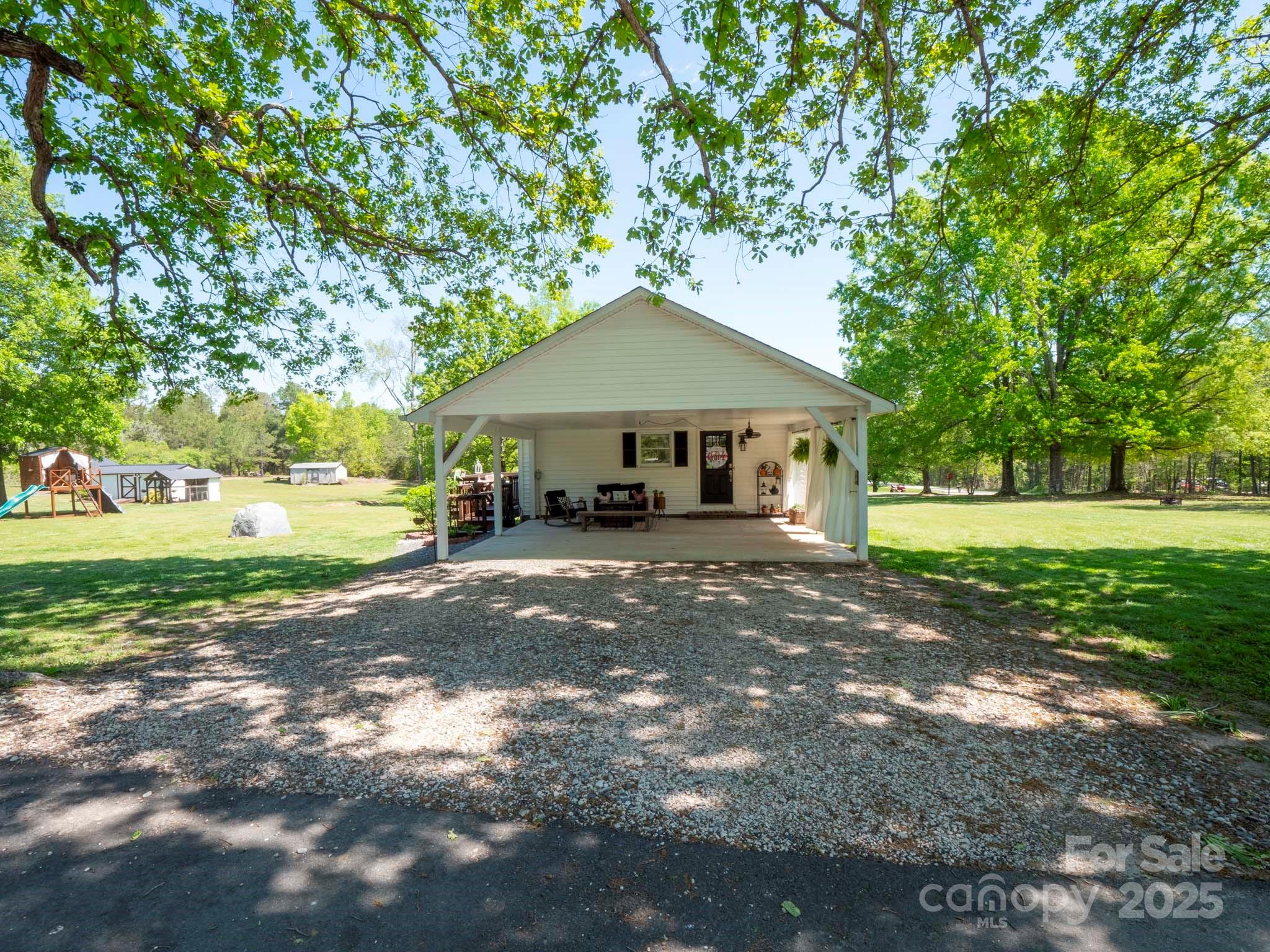 2008 Faulkner Road Clover, SC 29710 - Photo 3 of 26 a front view of a house with a yard