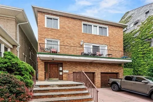 a car parked in front of a house