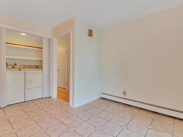 an empty room with a workbench