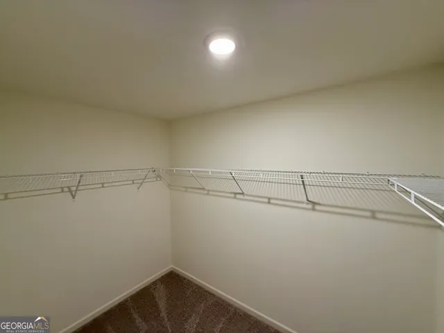 a view of a room with washer and dryer