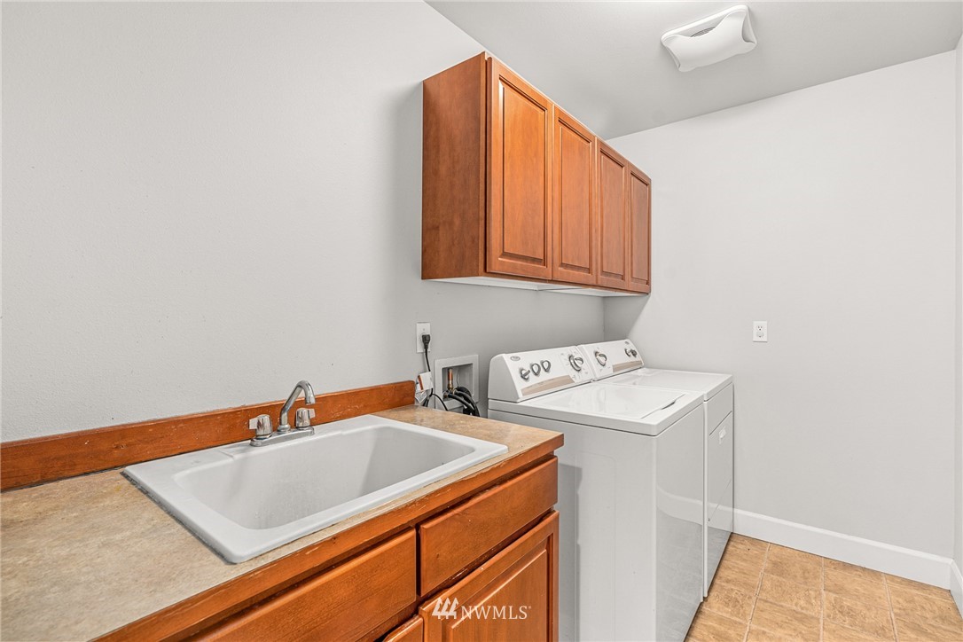 22424 6th Place West Bothell, WA 98021 - Photo 14 of 31 a utility room with dryer and washer