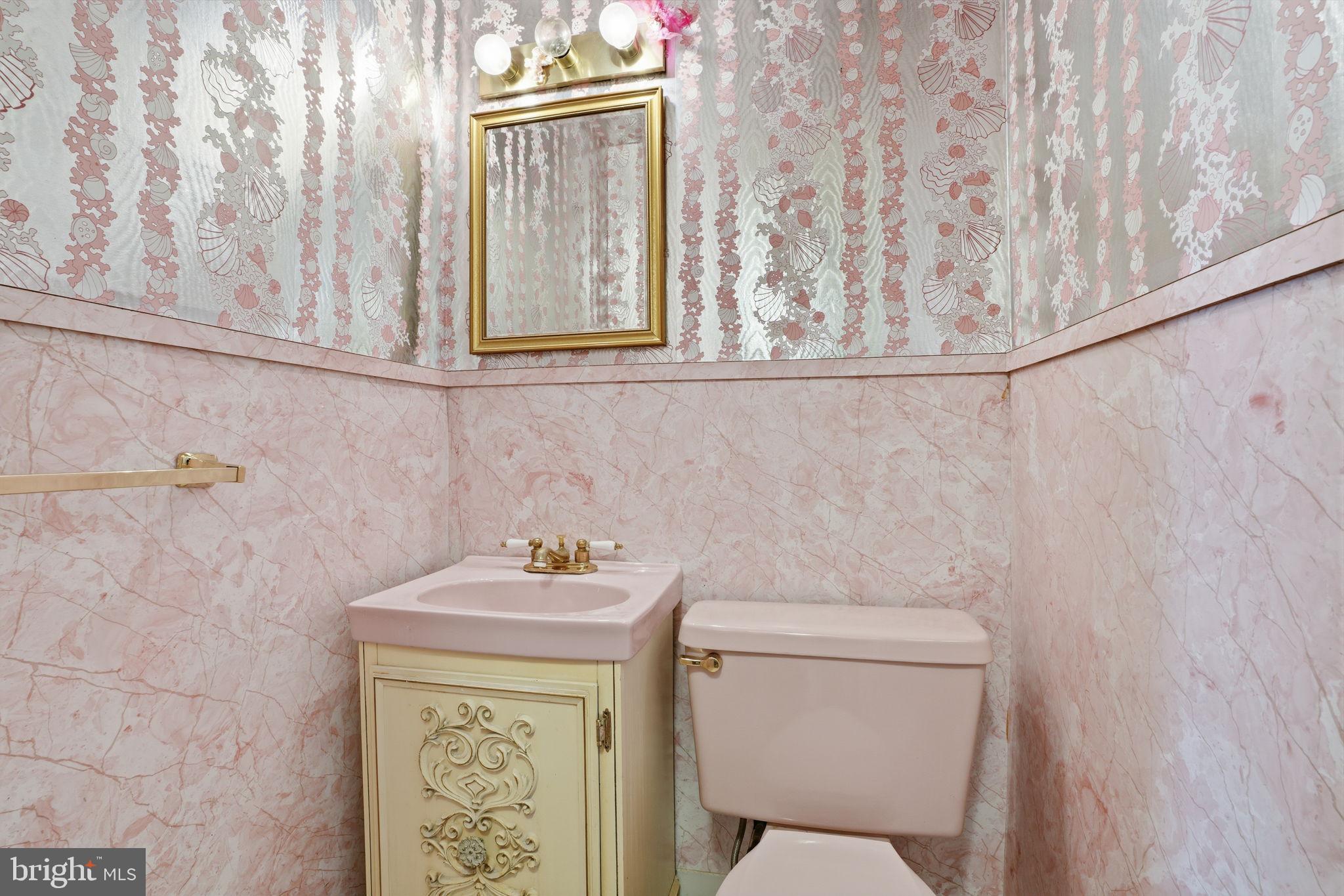 2035 Nester Street Philadelphia, PA 19115 - Photo 14 of 27 Charming vintage pink bathroom retreat.