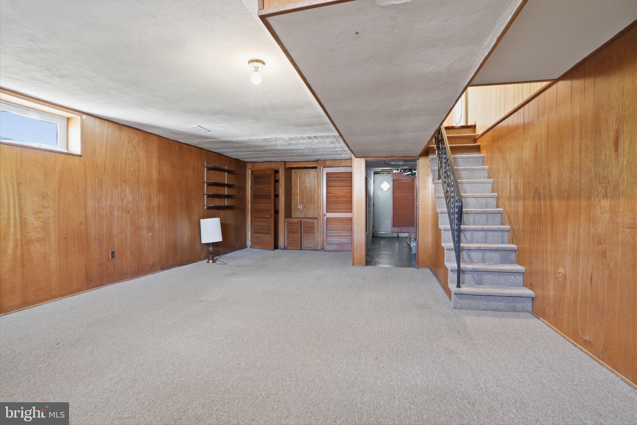 2035 Nester Street Philadelphia, PA 19115 - Photo 15 of 27 Spacious basement with warm wood accents.