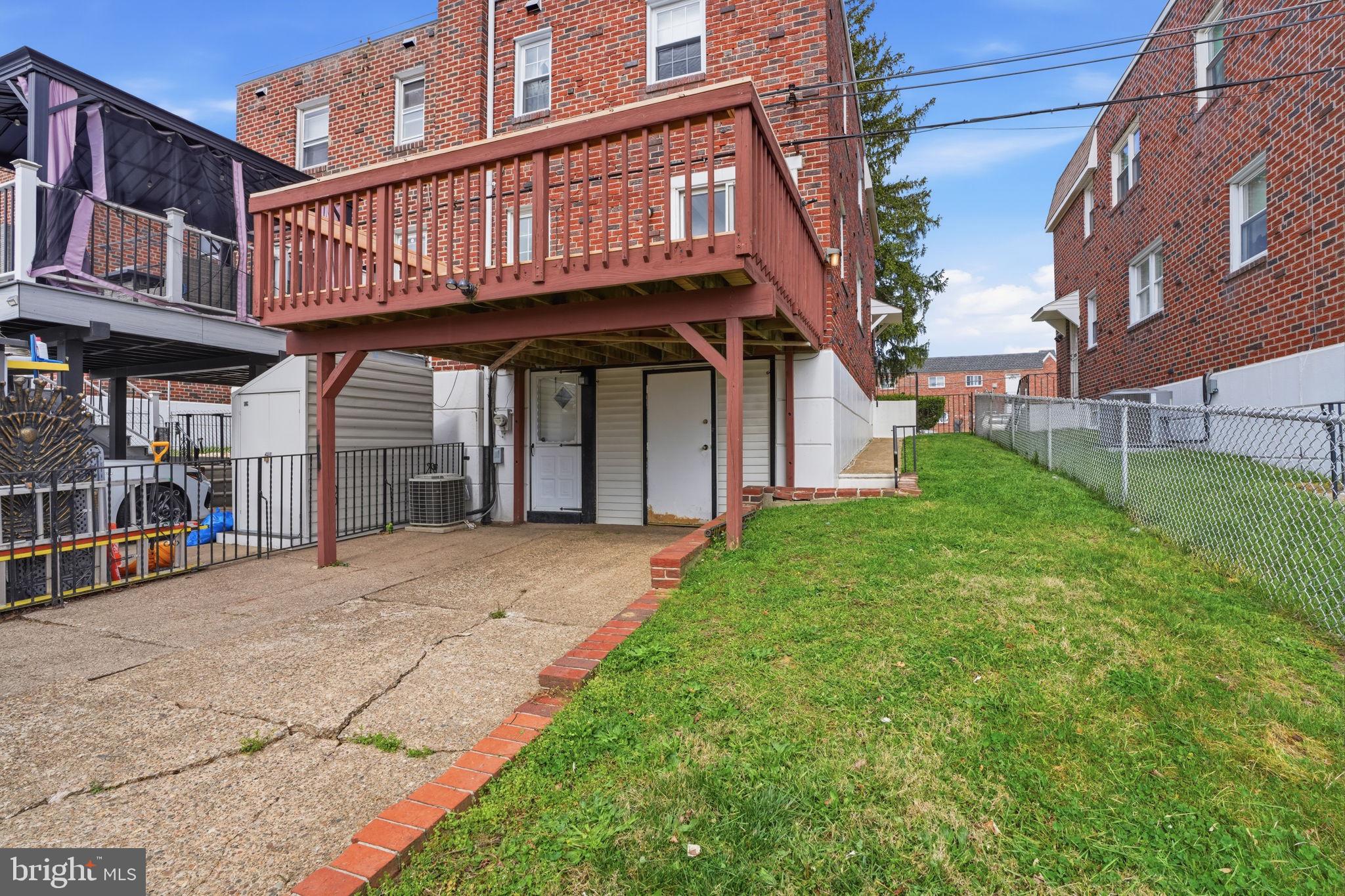 2035 Nester Street Philadelphia, PA 19115 - Photo 26 of 27 Charming backyard with elevated deck.