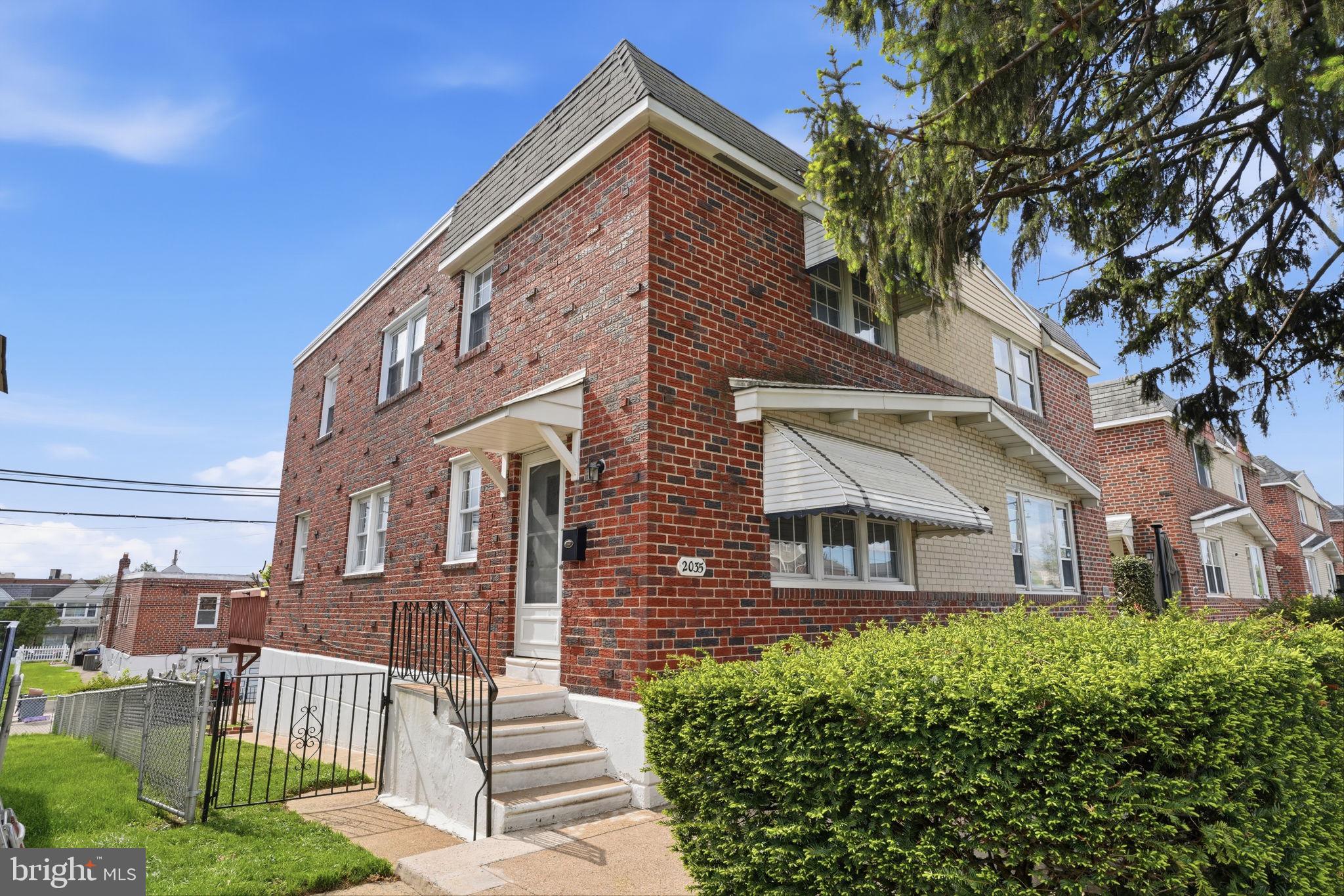 2035 Nester Street Philadelphia, PA 19115 - Photo 3 of 27 Charming brick duplex with lush greenery.