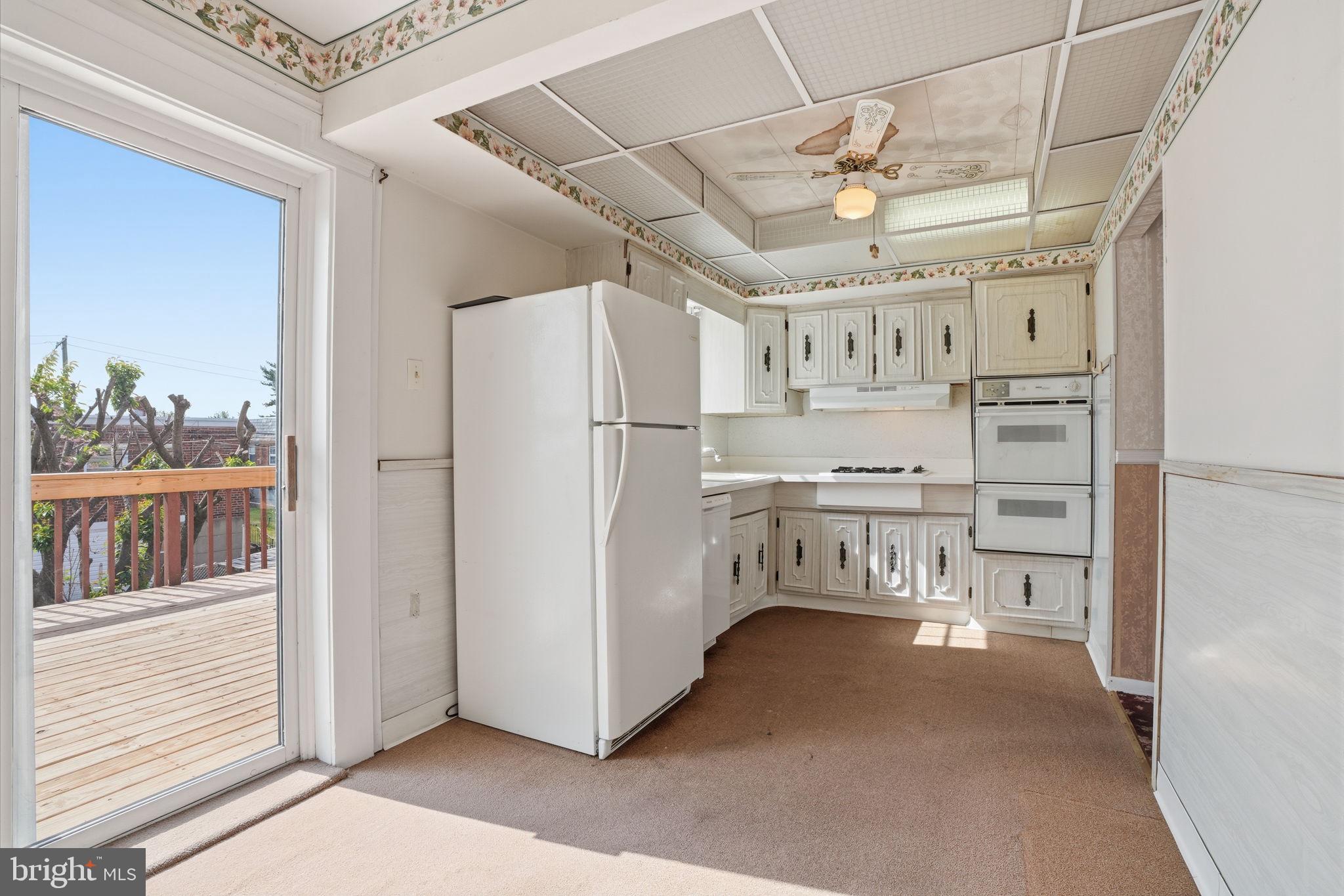 2035 Nester Street Philadelphia, PA 19115 - Photo 10 of 27 Bright kitchen with outdoor access.