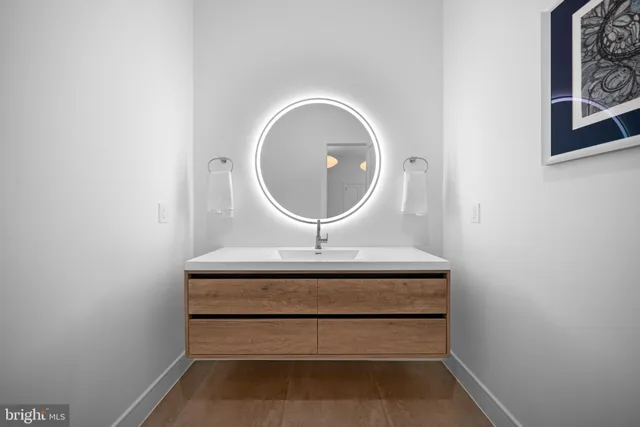 a dining room with furniture and a window