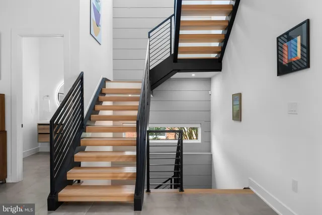 a view of a room with wooden floor and iron floor